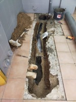 Arquetas ocultas en WC y cocinas en una Comunidad de vecinos de Barcelona